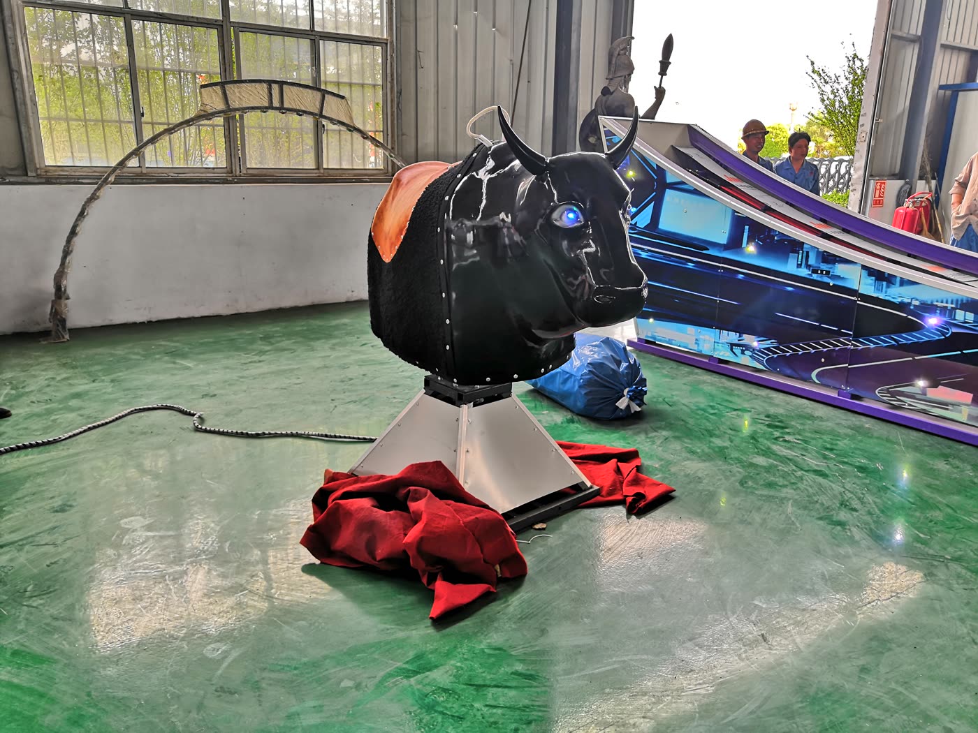 Black mechanical bull with white markings